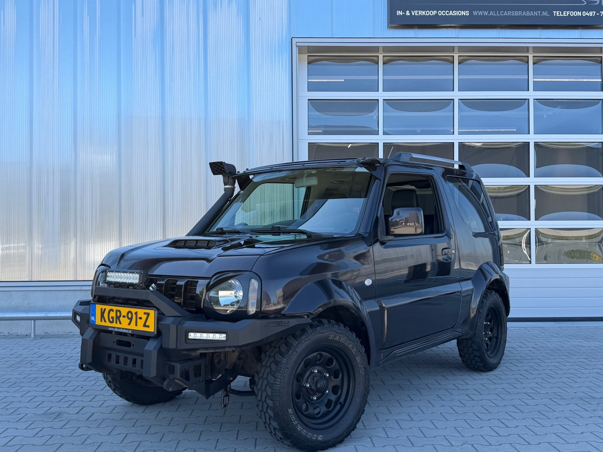 Suzuki Jimny 1.3 Exclusive / leder /4x4 /automaat/, Auto's, Automaat, 86 pk, Gebruikt, Zwart