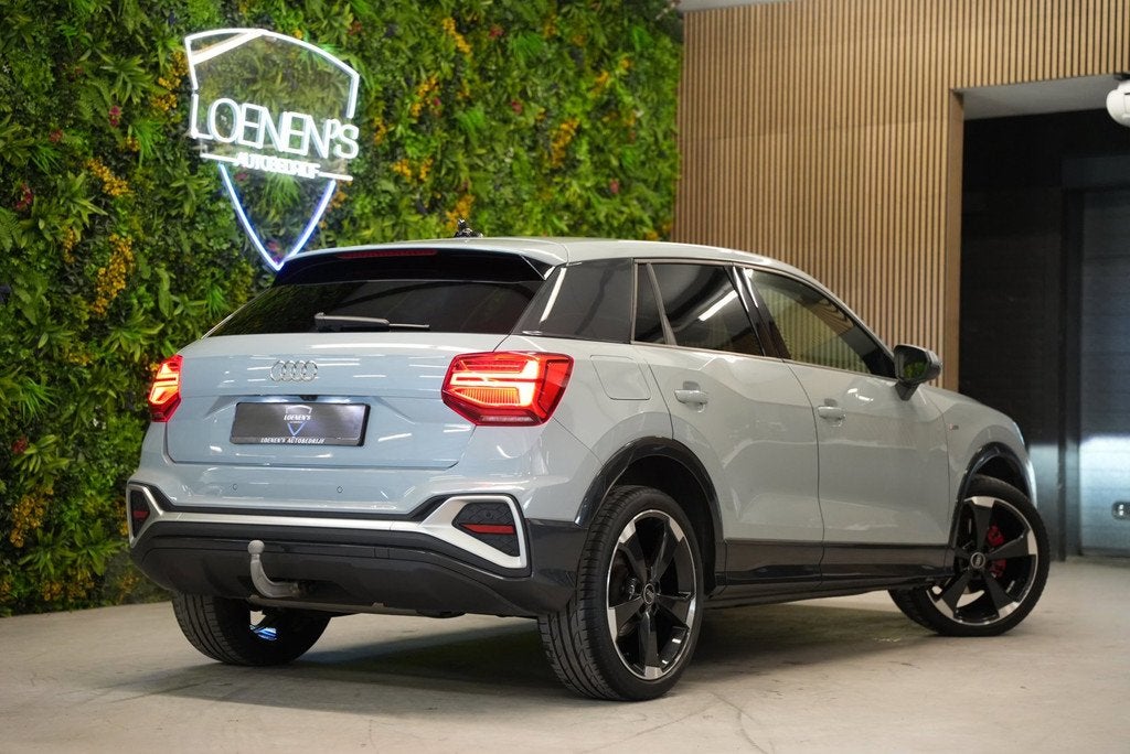 Audi Q2 35 TFSI 3x S-Line / Trekhaak / Camera / CarPlay, Auto's, Audi, Automaat, Gebruikt, 4 cilinders, 150 pk