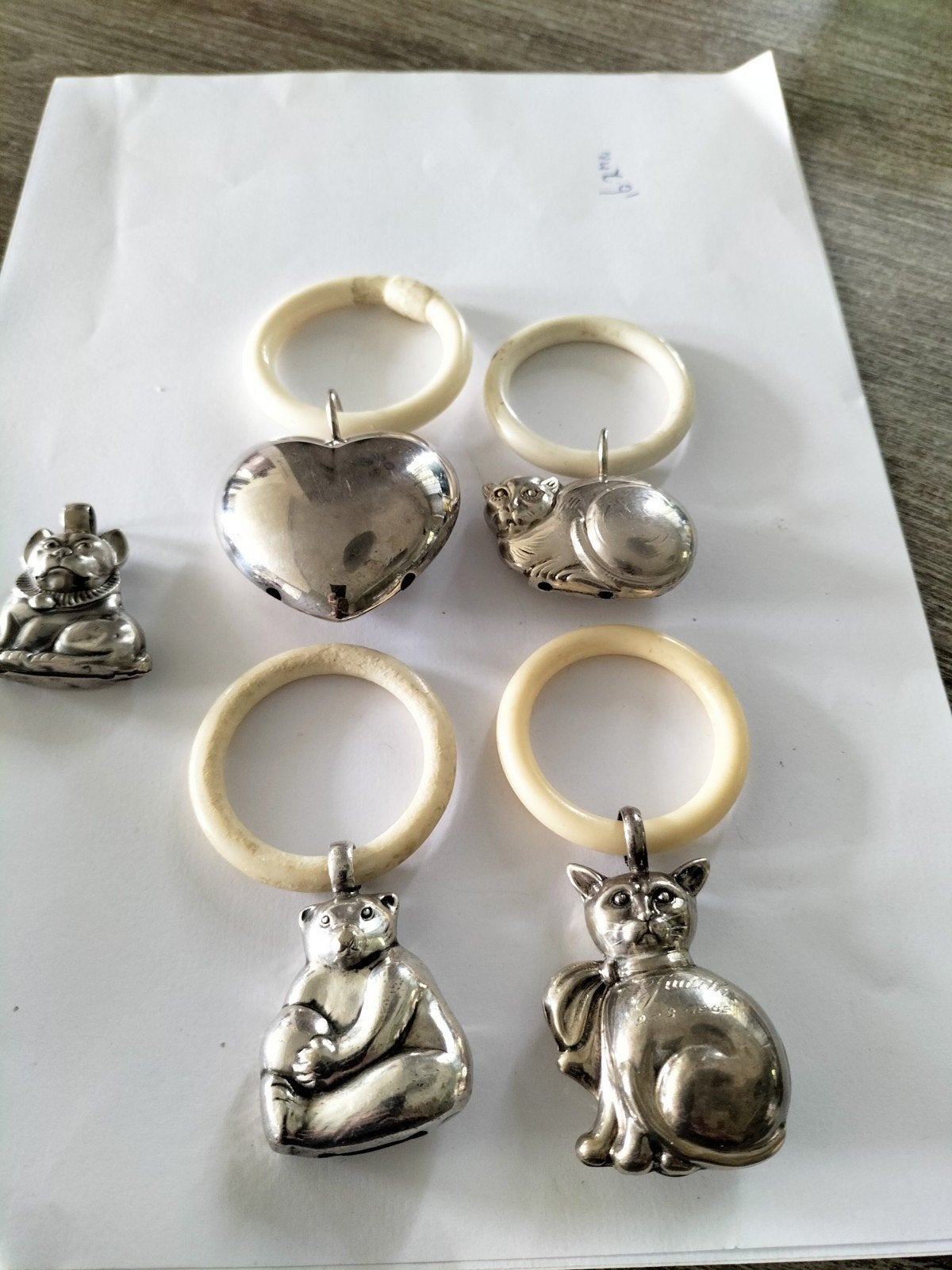 4 antieke zilveren bijtringen met dierenfiguren, Verzenden, Zilver
