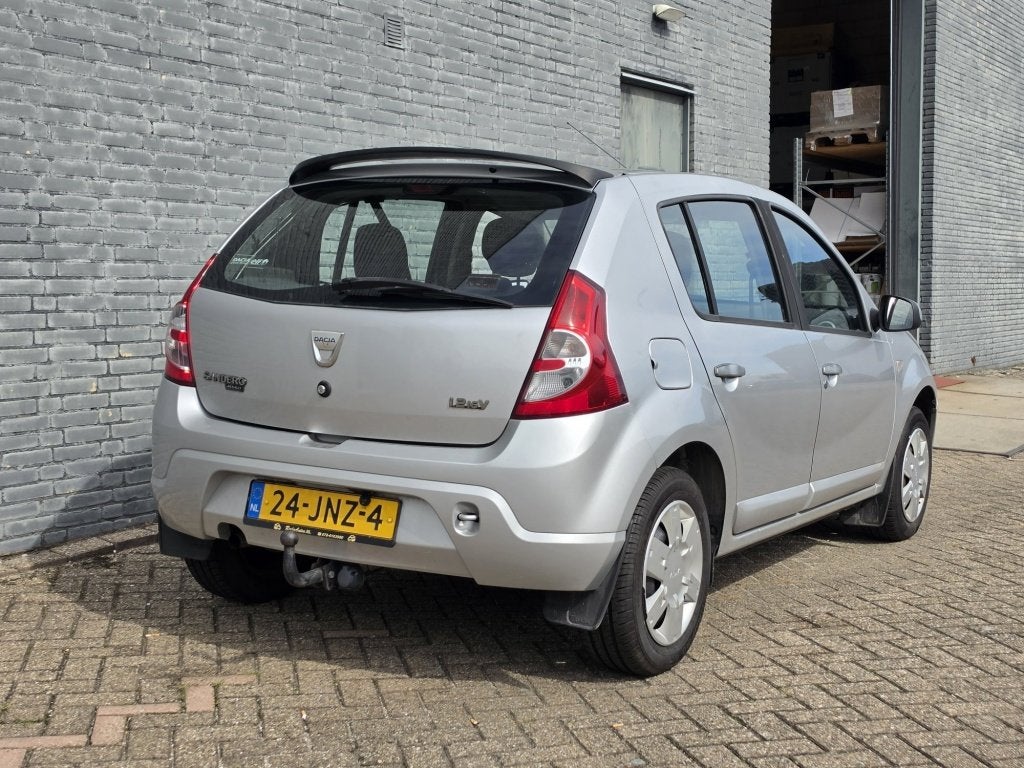 Dacia Sandero 1.2 Lauréate 5Drs Airco Carplay Nw APK ✅, Auto's, Gebruikt, 31 €/maand, Origineel Nederlands, Bedrijf