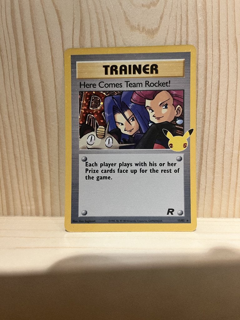 Here Comes Team Rocket #15 Pokemon Celebrations, Ophalen of Verzenden, Zo goed als nieuw, Losse kaart, Foil