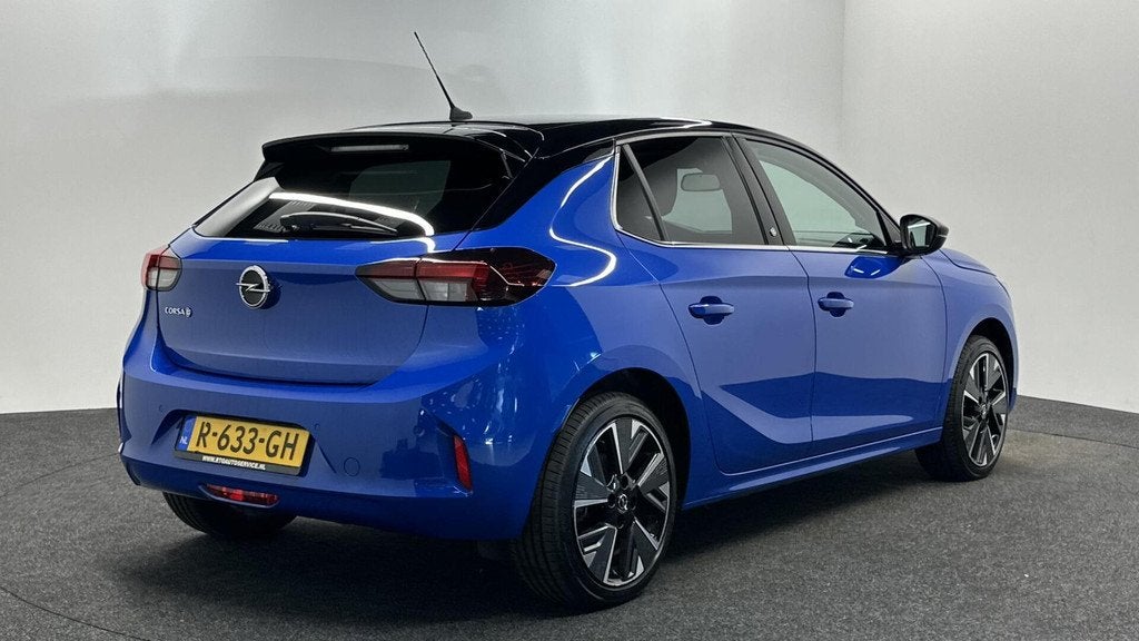 Opel Corsa-e Elegance 50 kWh 3 FASE SOH 90% CARPLAY LM CRUIS, Auto's, Gebruikt, Zwart, Met garantie (alle), Blauw