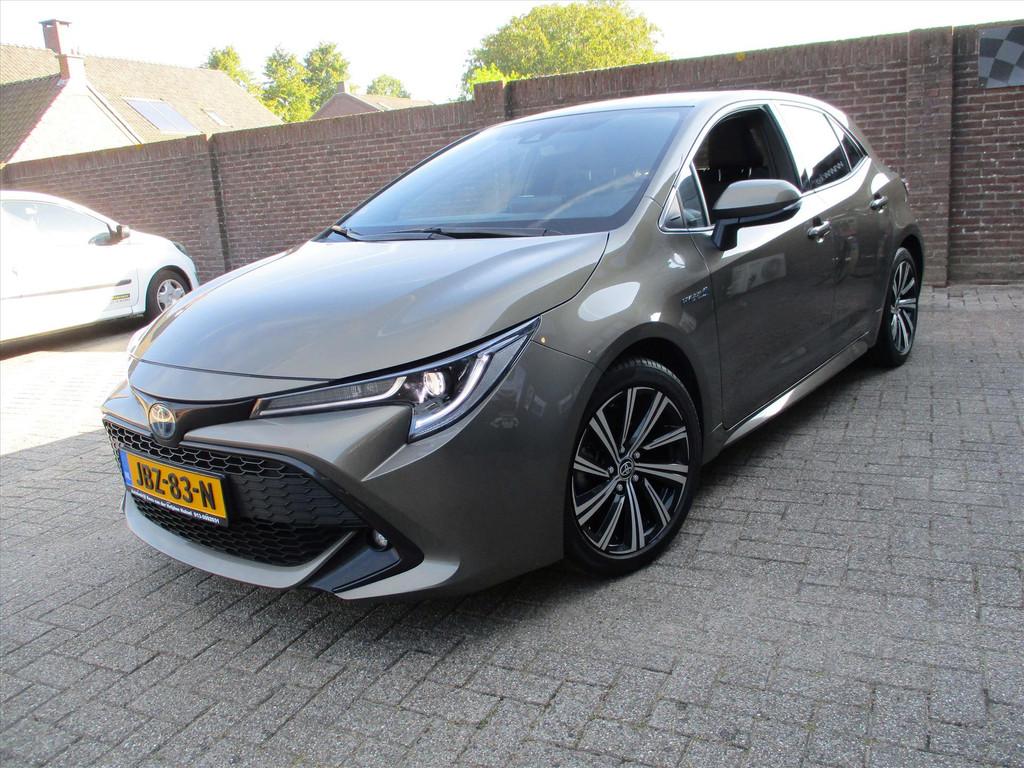 Toyota Corolla 1.8 Hybrid 122pk CVT Business, Gebruikt, 4 cilinders, Bruin, Corolla