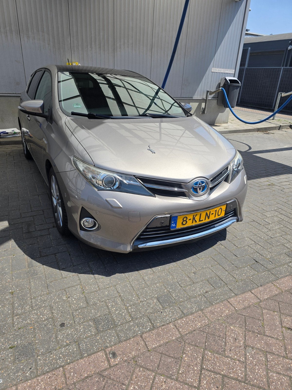 Toyota Auris 1.8 Full Hybrid 5DR CVT 2013 Bruin, Auto's, Toyota, 4 cilinders, Bruin, Origineel Nederlands, 26 km/l