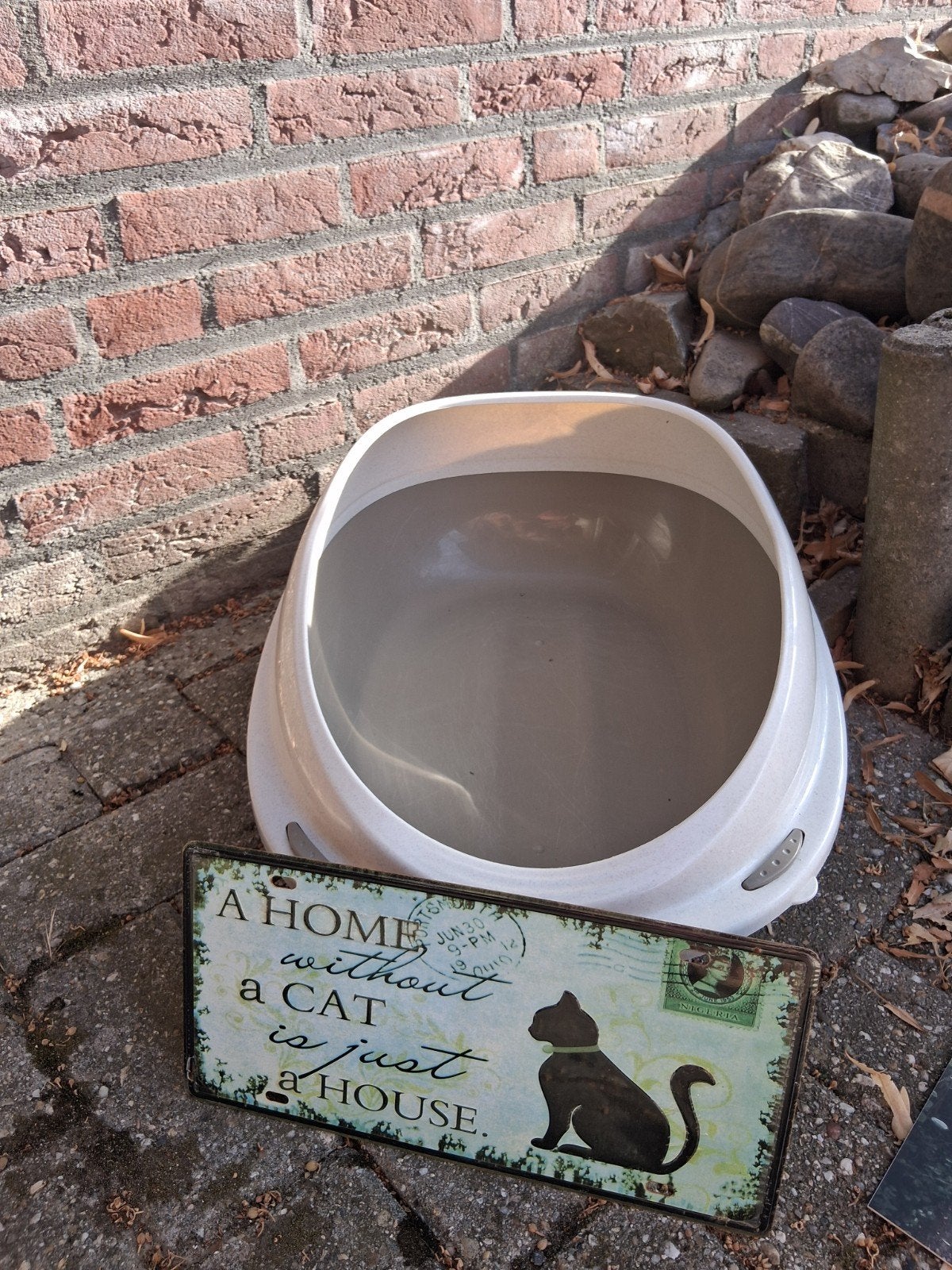 kattenbak, Ophalen
