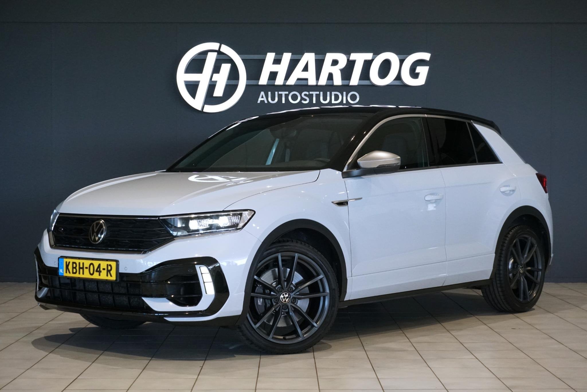 Volkswagen T-Roc 2.0 TSI 4Motion R *dealer onderhouden* + AK, Auto's, Volkswagen, Stof, Gebruikt, 4 cilinders, 1984 cc