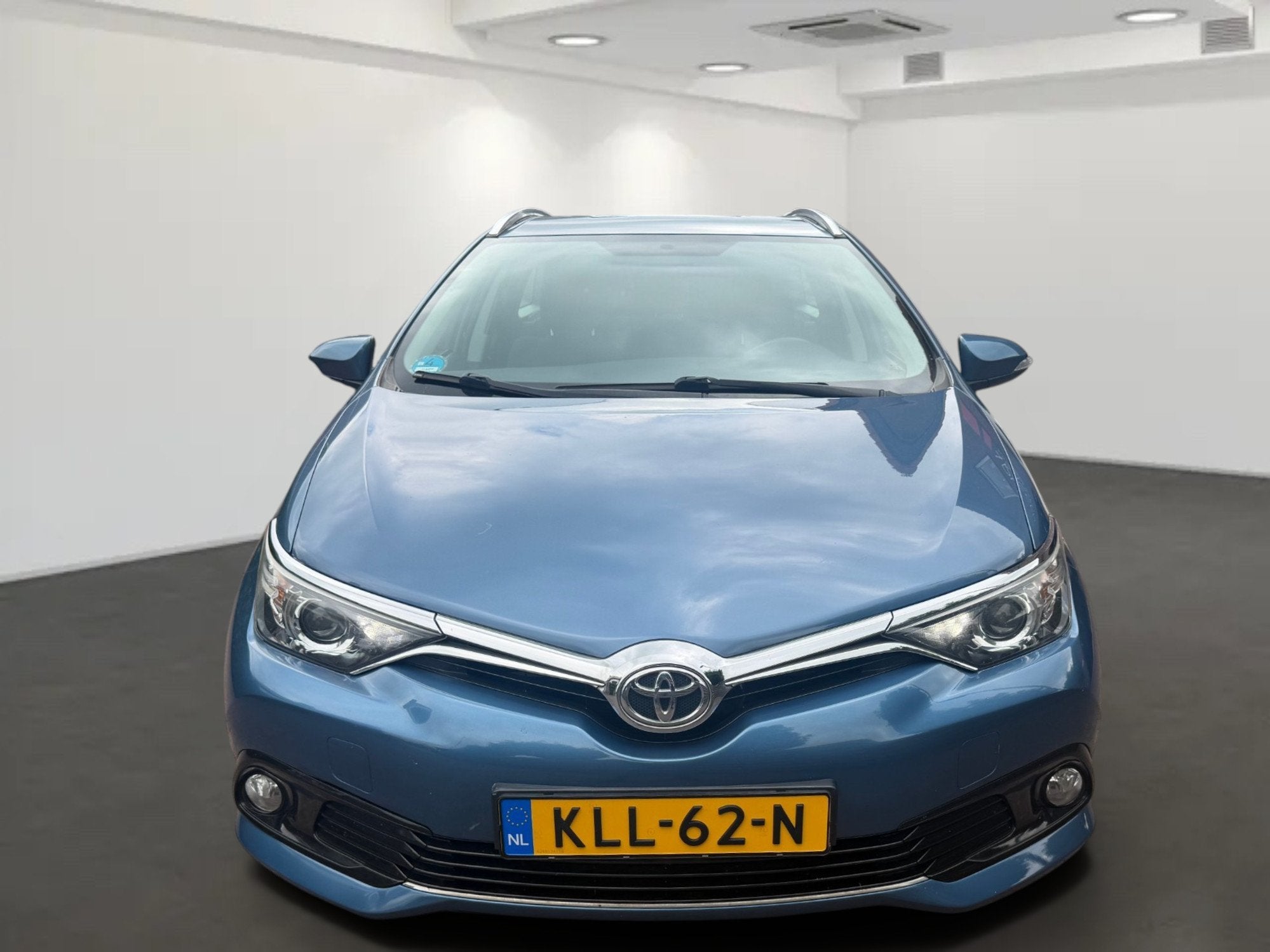 Toyota Auris Touring Sports 1.2T Aspiration Trekhaak, Auto's, Gebruikt, Euro 6, 4 cilinders, Blauw