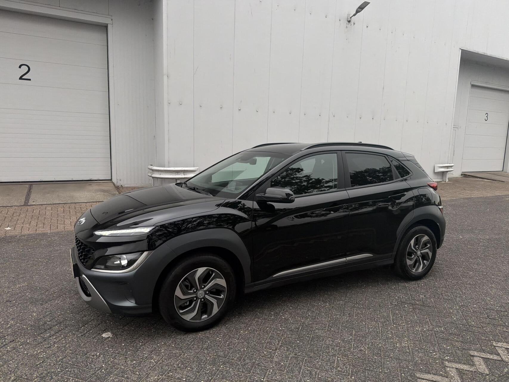 Hyundai Kona 1.6 GDI HEV Fashion - FACELIFT/NAVI/HUD/CAM/NAP, Auto's, Gebruikt, Euro 6, Zwart, Origineel Nederlands
