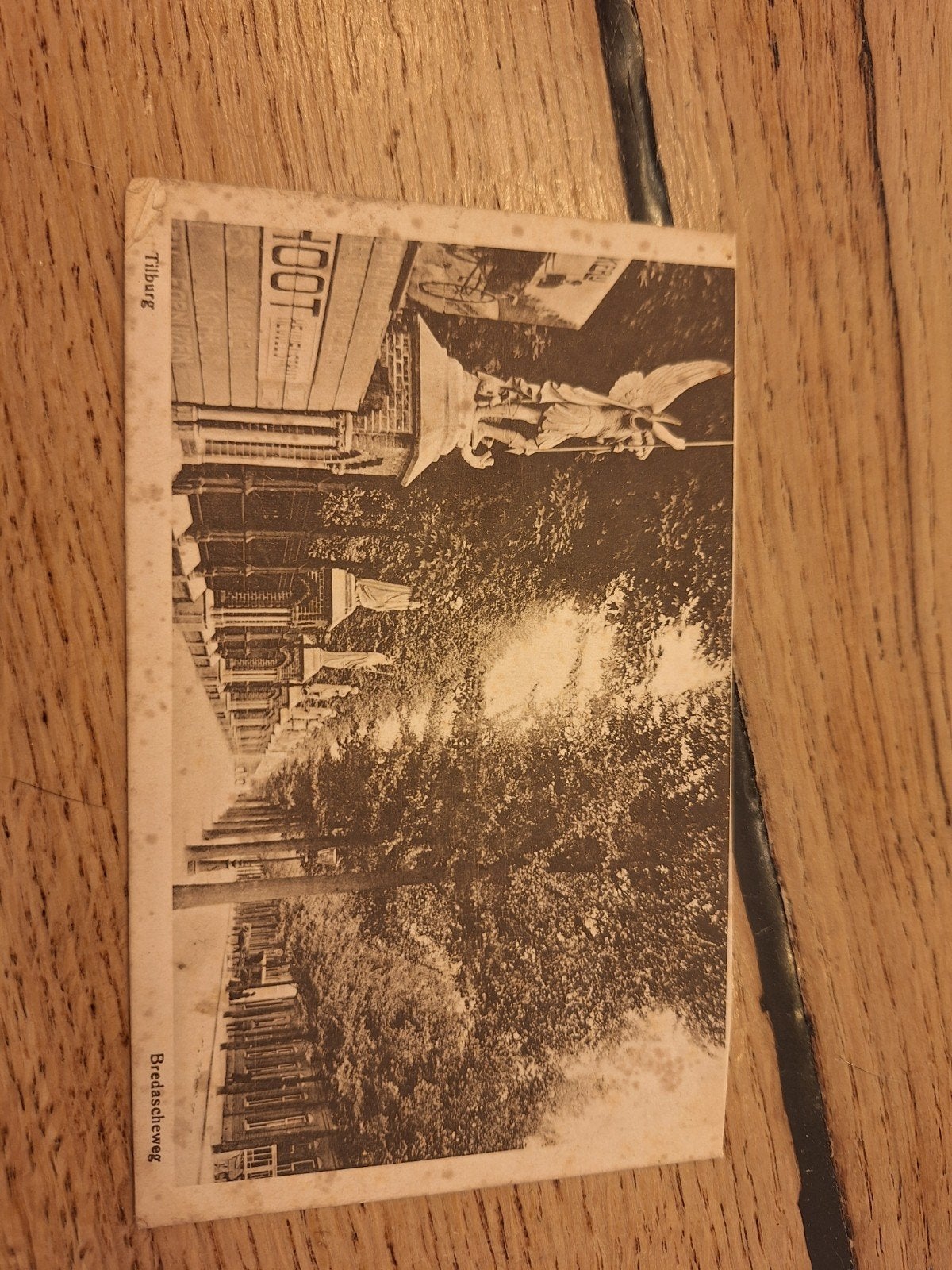 Oude ansichtkaart Tilburg, Bredaschweg met standbeeld, Ophalen of Verzenden, Voor 1920, Gelopen, Noord-Brabant