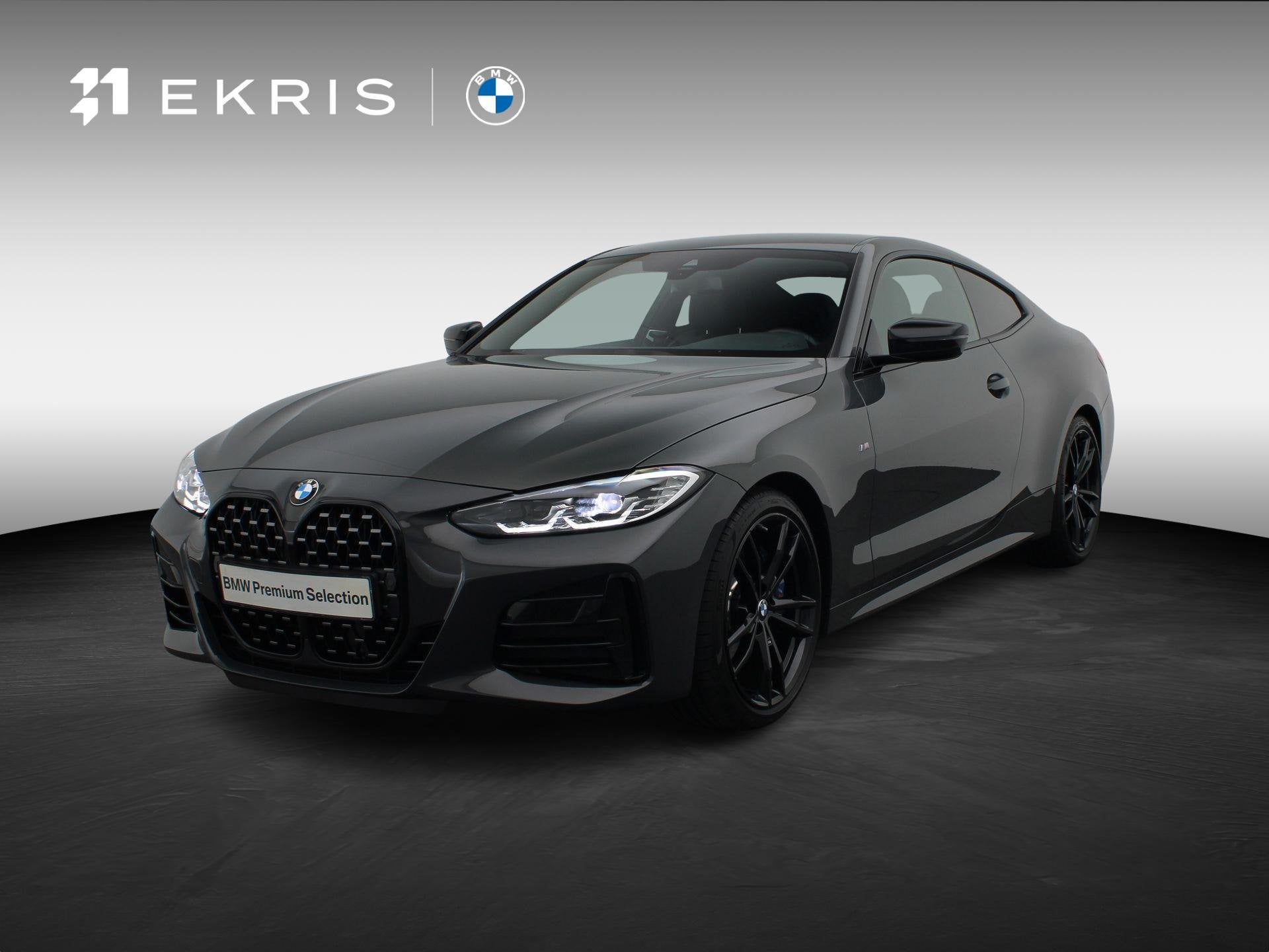 BMW 4 Serie Coupé M440i xDrive High Executive | Elektrisch, Auto's, Automaat, Stof, Met garantie (alle), 4 stoelen