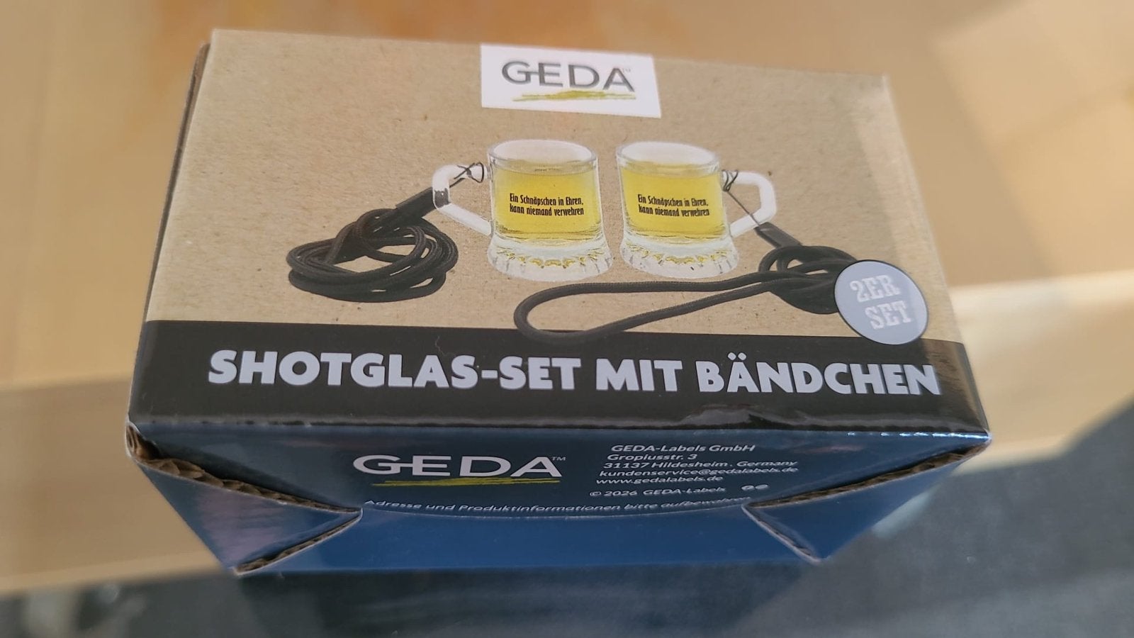 2 shotglazen met bandjes shotglas mit bändchen, Verzamelen, Glas en Borrelglaasjes, Ophalen of Verzenden, Zo goed als nieuw, Borrel- of Shotglas