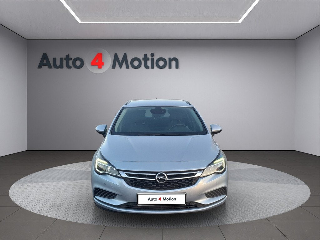 Opel Astra Sports Tourer 1.4 Turbo Cosmo Met ECC / NAVIG / C, Voorwielaandrijving, 125 pk, Gebruikt, Euro 6