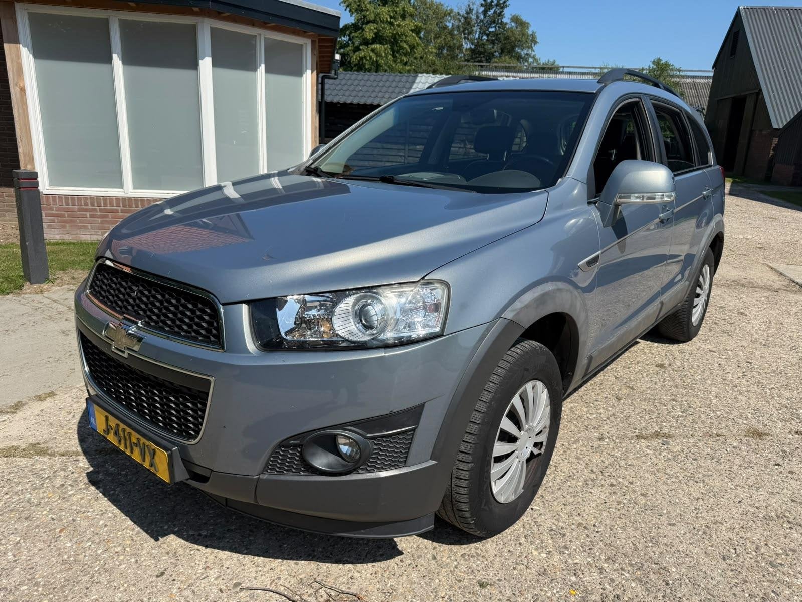 Chevrolet Captiva 2.4i LT 2WD 7 pers, Voorwielaandrijving, Euro 5, Gebruikt, Zwart
