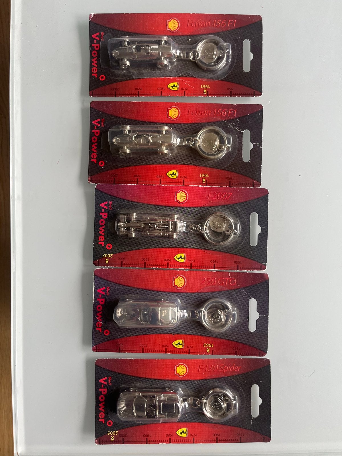 5 Shell V-Power Ferrari sleutelhangers (1 dubbel), Verzamelen, Sleutelhangers, Verzenden, Nieuw, Merk