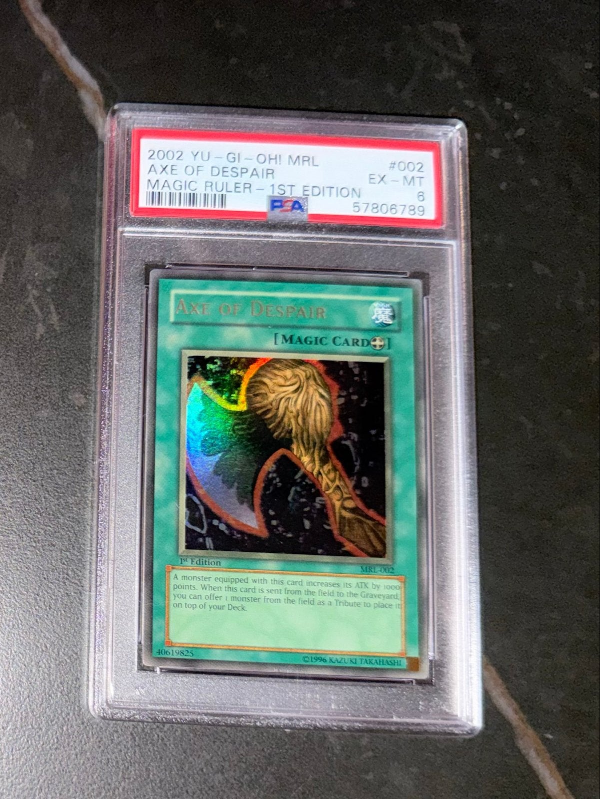 Yu-Gi-Oh! Axe of Despair MRL 1st Edition PSA 6, Ophalen of Verzenden, Zo goed als nieuw, Losse kaart