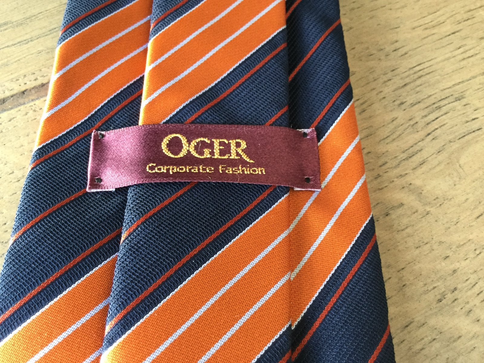 Nieuwe Oger stropdas - Oranje/Blauw gestreept, Ophalen of Verzenden, Nieuw, Oranje, Met patroon