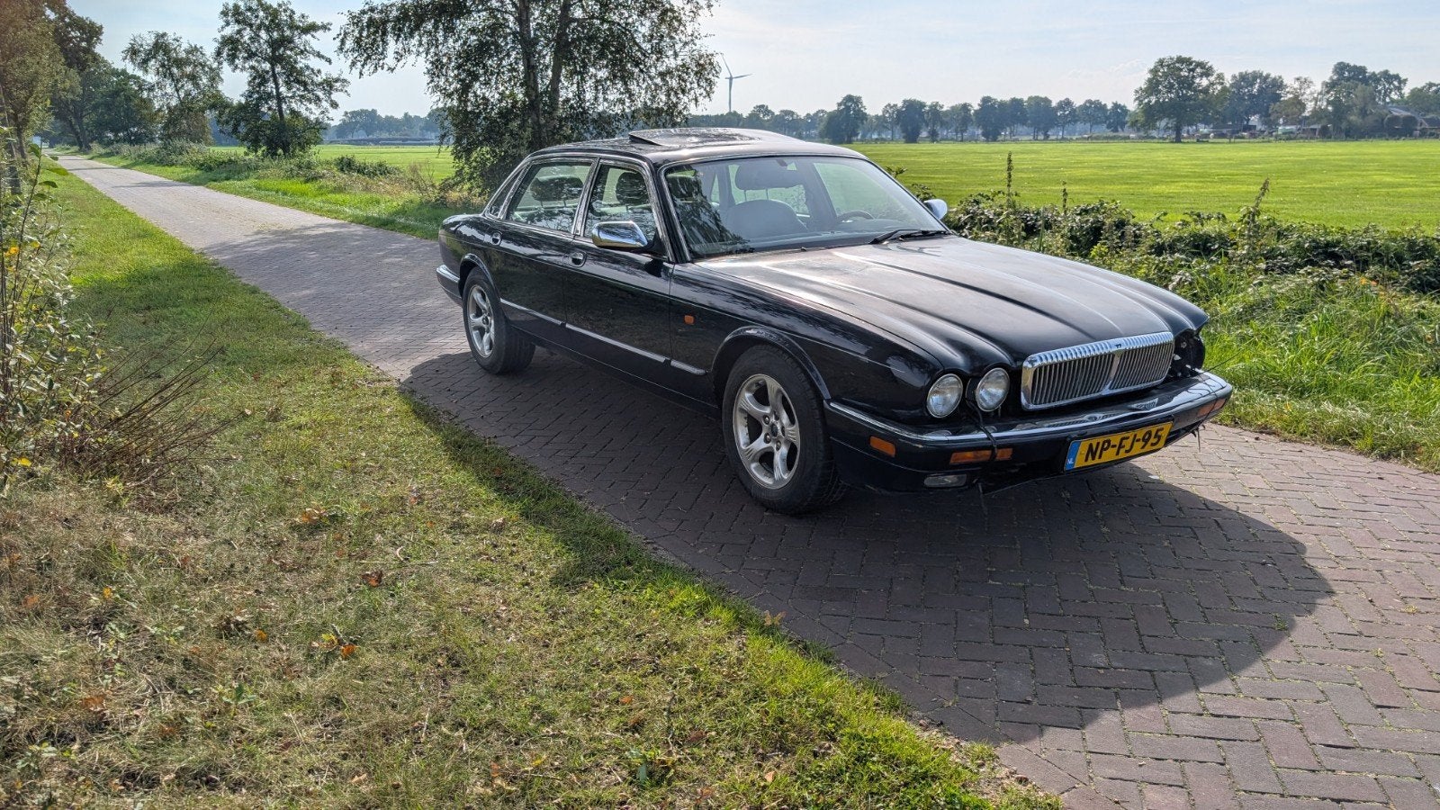 Daimler Double-six 6.0 LWB AUT 1996 Blauw, Auto's, Automaat, Achterwielaandrijving, Beige, 12 cilinders