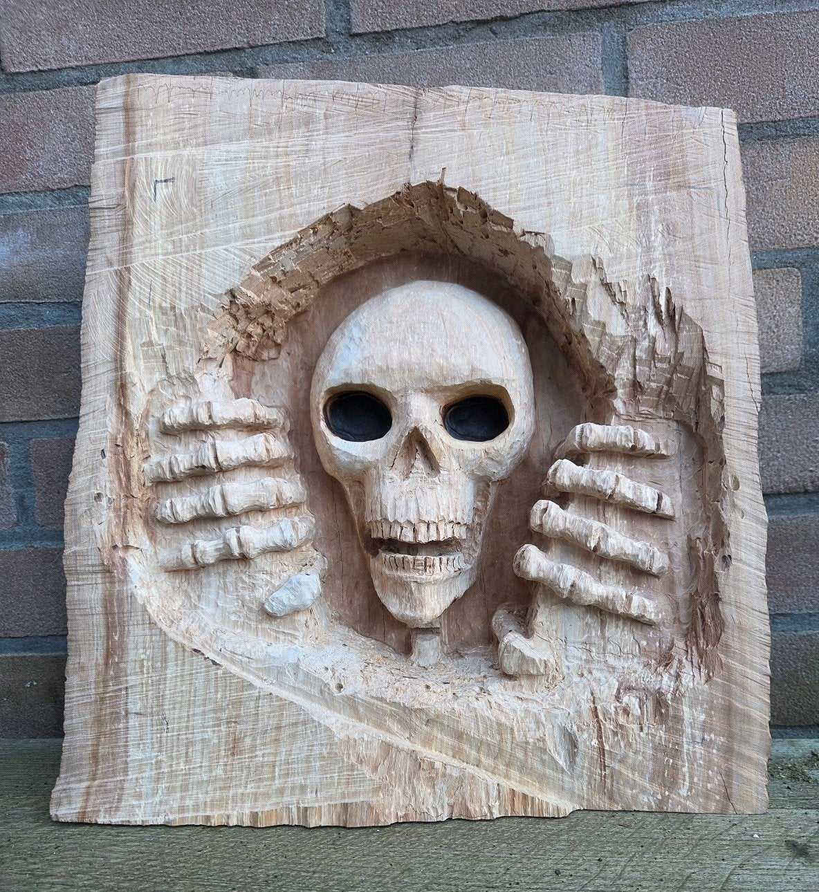 Handgemaakte Skull uit boomstam, Ophalen