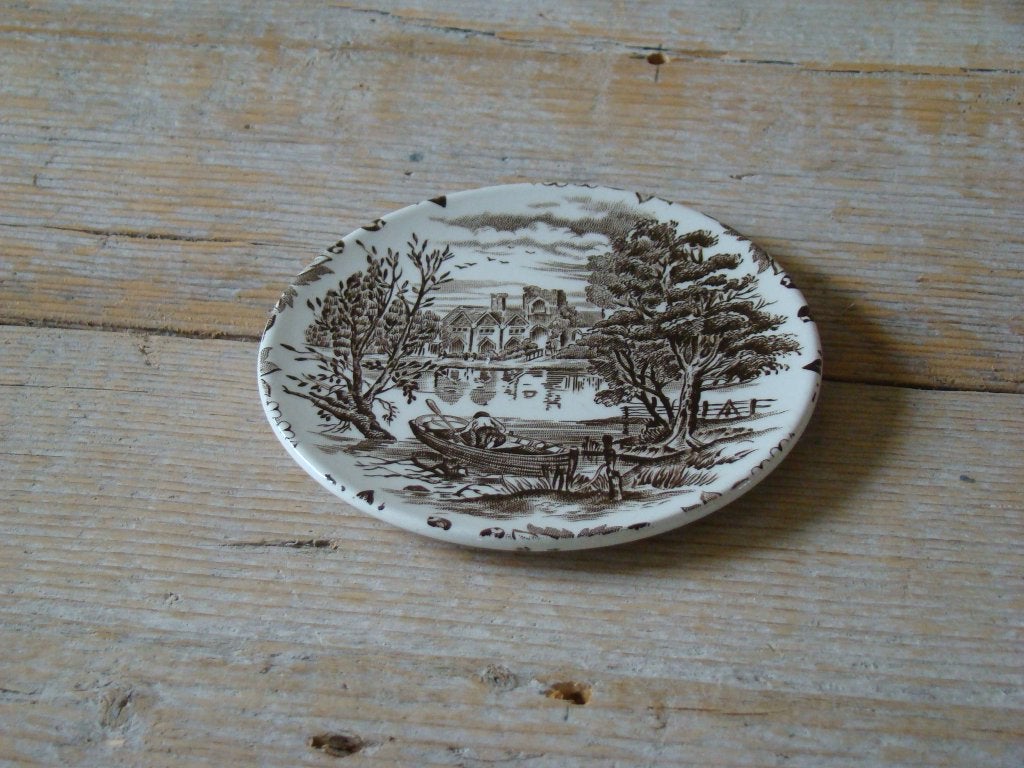 1x Onderzetter, Engels bruin, CASTLES, zo goed als nieuw, Ophalen of Verzenden