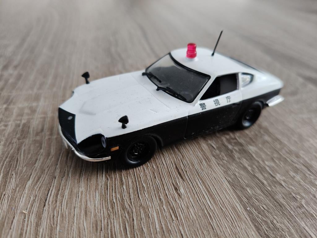 Datsun 240 Z Japanse politie 1:43, tijdschrift model izgs, Hobby en Vrije tijd, Modelauto's | 1:43, Ophalen of Verzenden, Zo goed als nieuw