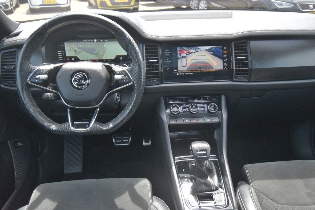 Skoda Kodiaq 1.5 TSI Sportline Business 7-Pers. , EL PANORAM, Auto's, Skoda, 4 cilinders, 150 pk, 7 stoelen, Bedrijf