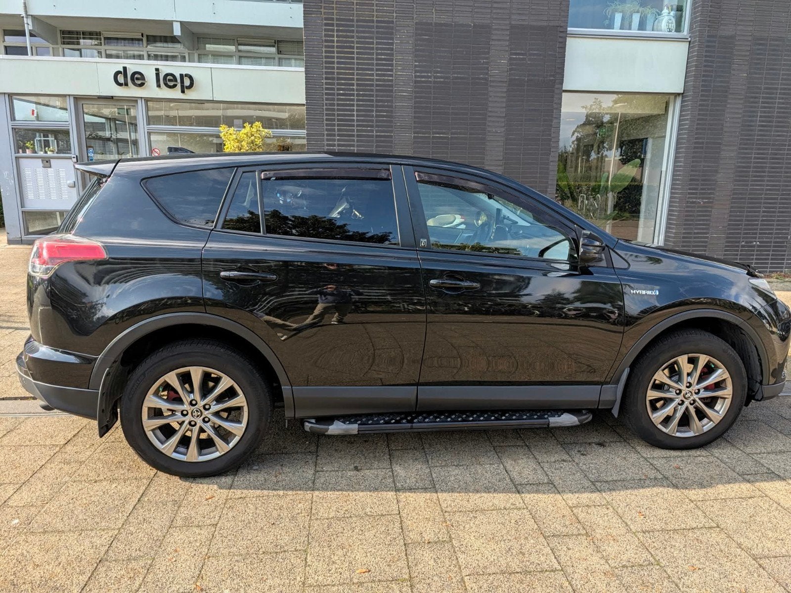 Toyota Rav4 2.5 Vvt-i Hybrid 197pk 2WD Aut 2019 Zwart, Auto's, Zwart, 155 pk, Rav4, 93 €/maand