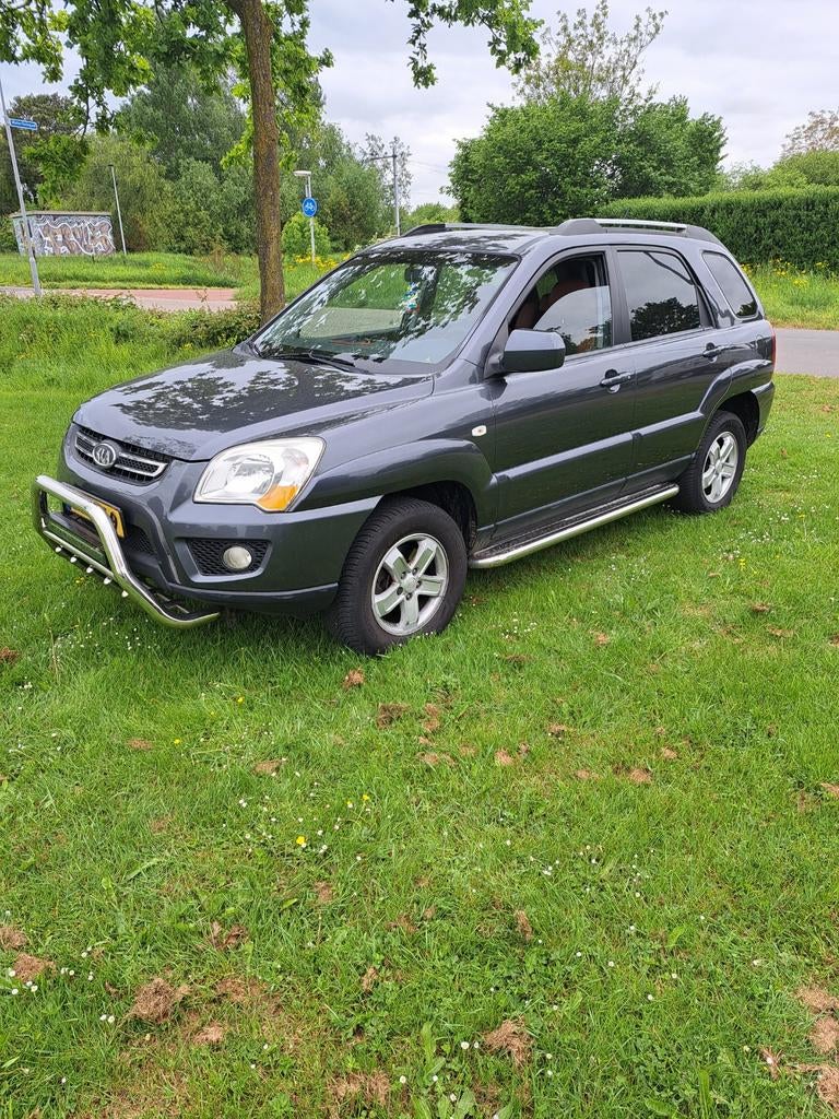 Kia Sportage v6  2.7 4WD AUT 2009 Grijs, Automaat, Bruin, Vierwielaandrijving, 1600 kg