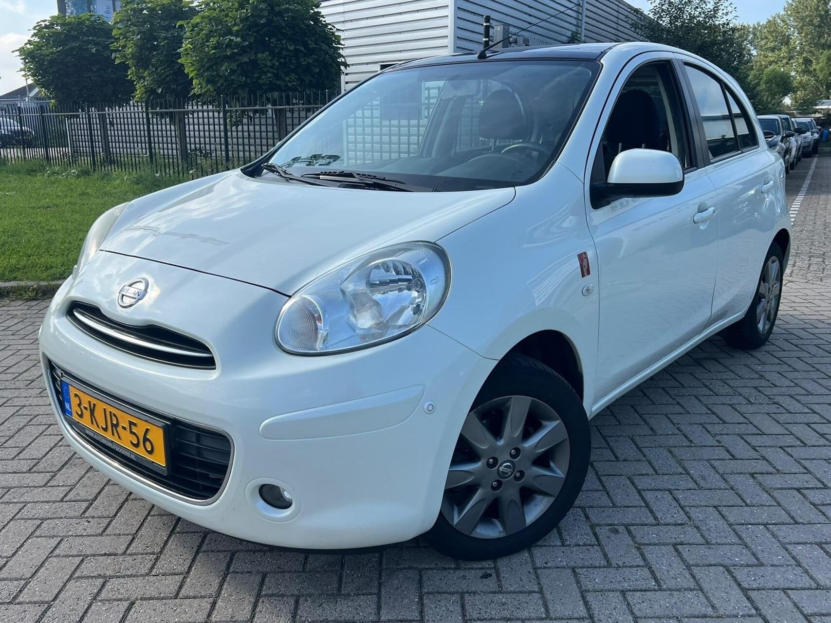 Nissan Micra 1.2 DIG-S Tekna 2013 5DRS Clima Pano Cruise, Auto's, Voorwielaandrijving, Euro 5, Stof, Zwart