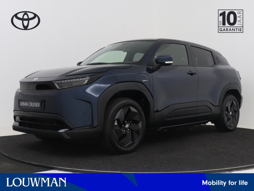 Toyota Urban Cruiser Dynamic 61 kWh (bj 2026, automaat), 12 maanden, Stof, Automatische klimaatregeling, Blauw