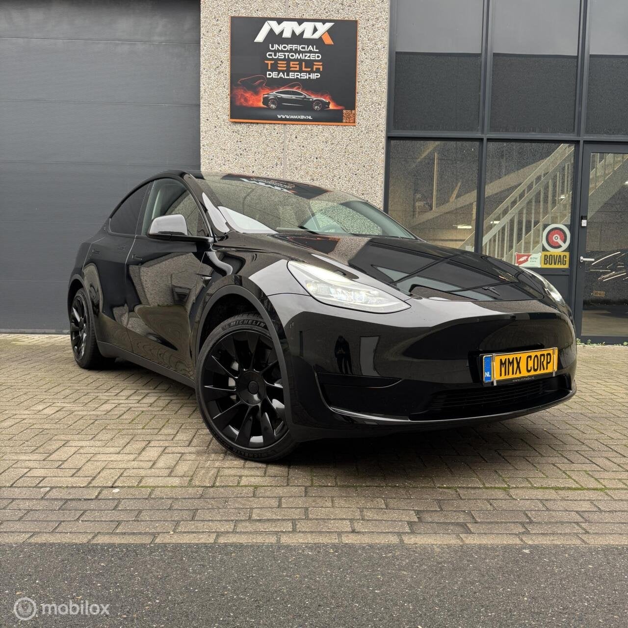 Tesla model Y Long Range AWD+MMX PACK+20"+TREKHAAK+SOH 95.9%, Automaat, 389 pk, Gebruikt, Zwart