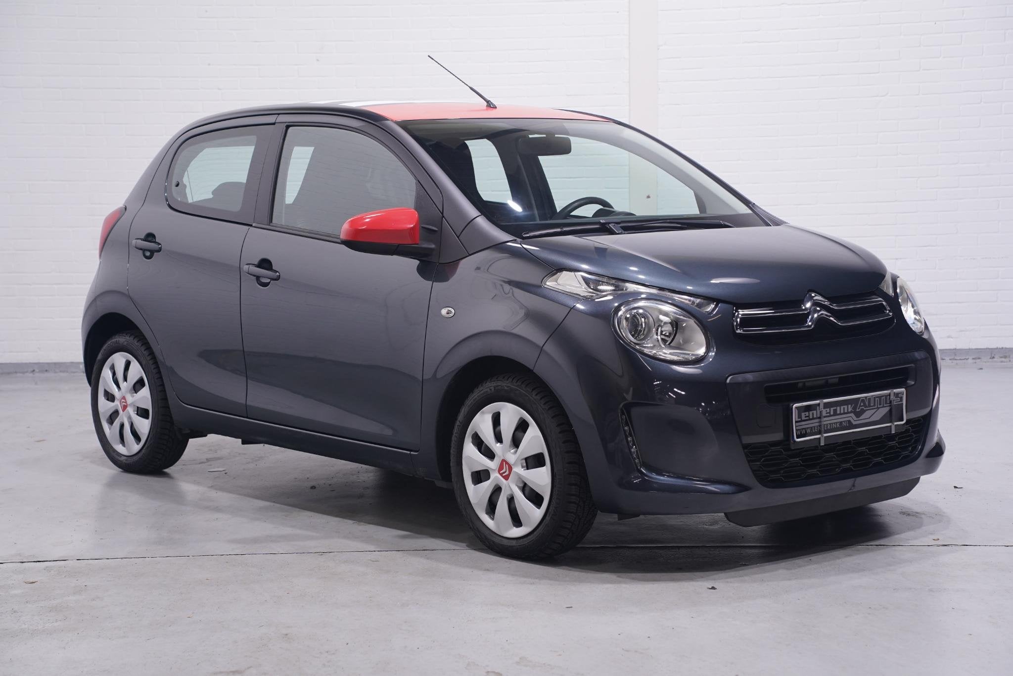Citroen C1 1.2 PureTech Shine airco bleutooth stuurbediening, Voorwielaandrijving, Stof, Gebruikt, Euro 6