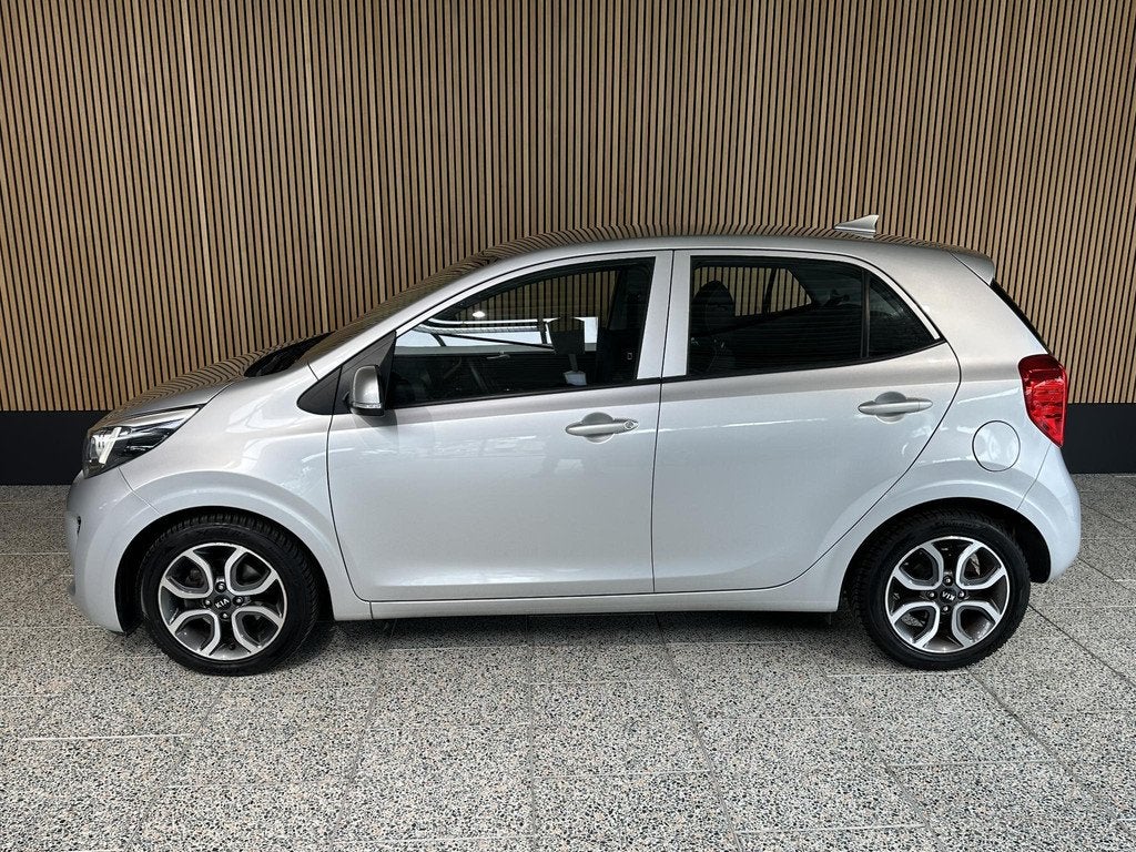 Kia Picanto 1.2 CVVT First Edition Cruise controle | Camera, Auto's, Kia, Stof, Gebruikt, 4 cilinders, Automatische klimaatregeling