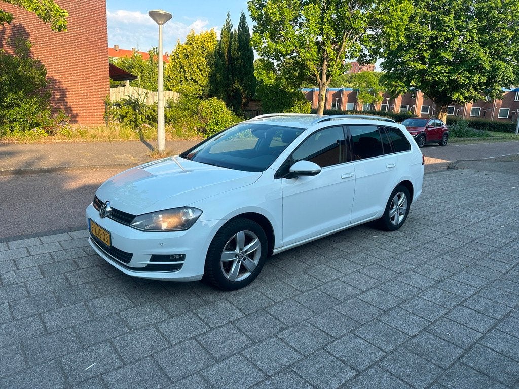 Volkswagen Golf Variant 1.2 TSI Highline Automaat Invalide h, Auto's, Volkswagen, Euro 5, Gebruikt, Zwart, 4 cilinders