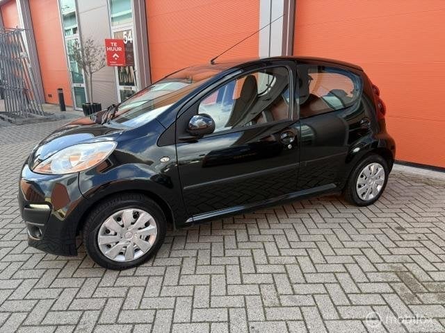 Peugeot 107 1.0 Active 5 DRS -AIRCO-APK 2027-EXTR'S, Voorwielaandrijving, Gebruikt, 4 stoelen, Origineel Nederlands