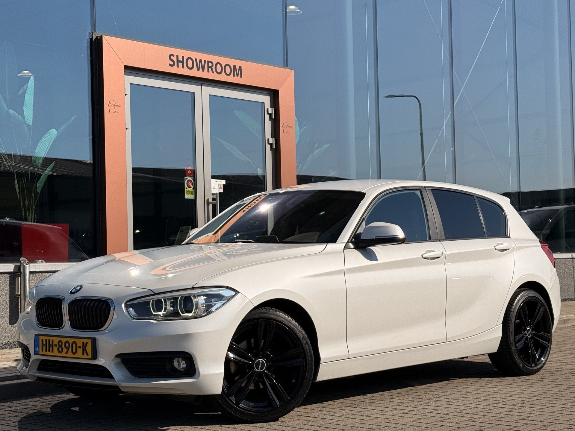 BMW 1-serie 118i EDE Corporate Lease Essential | Cruise | Na, Auto's, Gebruikt, Wit, Origineel Nederlands, Bedrijf