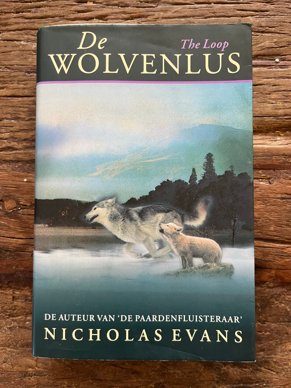 De Wolvenlus - Nicholas Evans, Ophalen of Verzenden, Zo goed als nieuw, Nederland