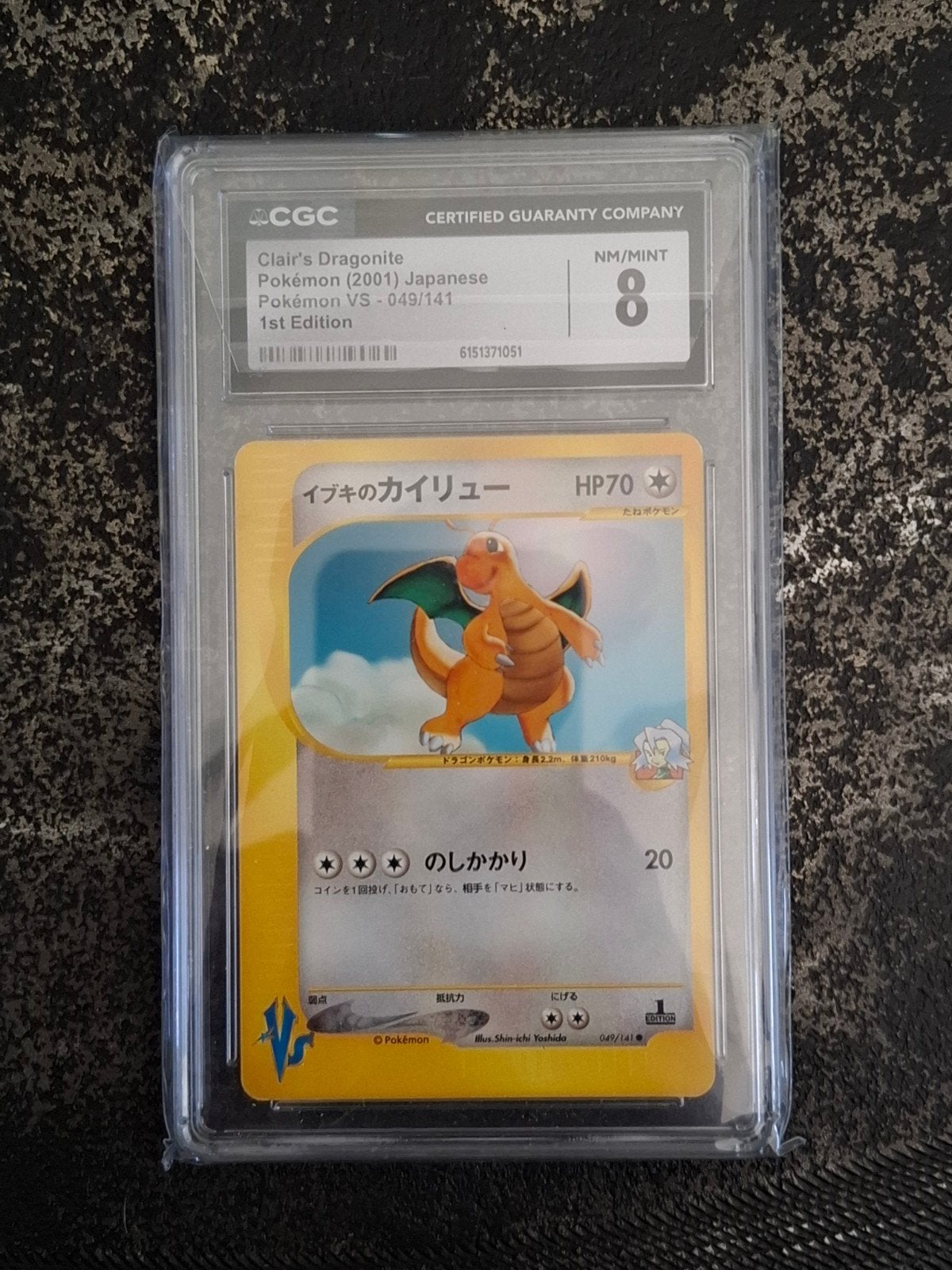 Pokemon Clair's dragonite 1st Edition #49 CGC 8, Hobby en Vrije tijd, Ophalen of Verzenden, Zo goed als nieuw