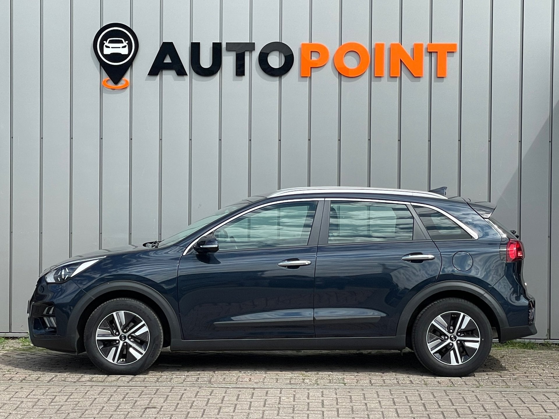 Kia Niro 1.6 GDi Hybrid DynamicLine DEALER OND EERSTE EIG, Auto's, Gebruikt, Blauw, Leder en Stof, Origineel Nederlands