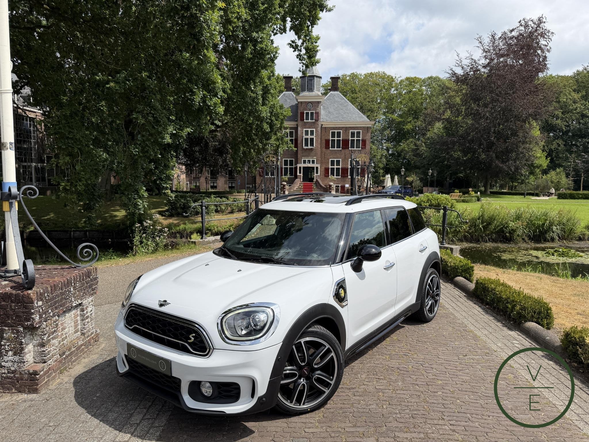 MINI Countryman 1.5 Cooper S E ALL4 Chili | Pano | Camera |, Auto's, Mini, 8 kWh, Gebruikt, Countryman, Wit