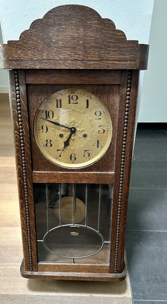 Antieke wandklokken, Ophalen