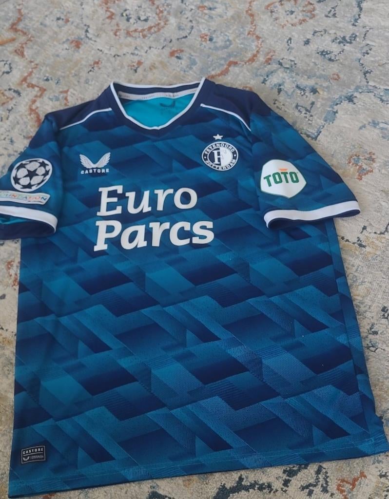 Feyenoord uitshirt Gimenez (Castore) - CL & TOTO patches, Maat 52/54 (L), Ophalen of Verzenden, Zo goed als nieuw, Voetbal