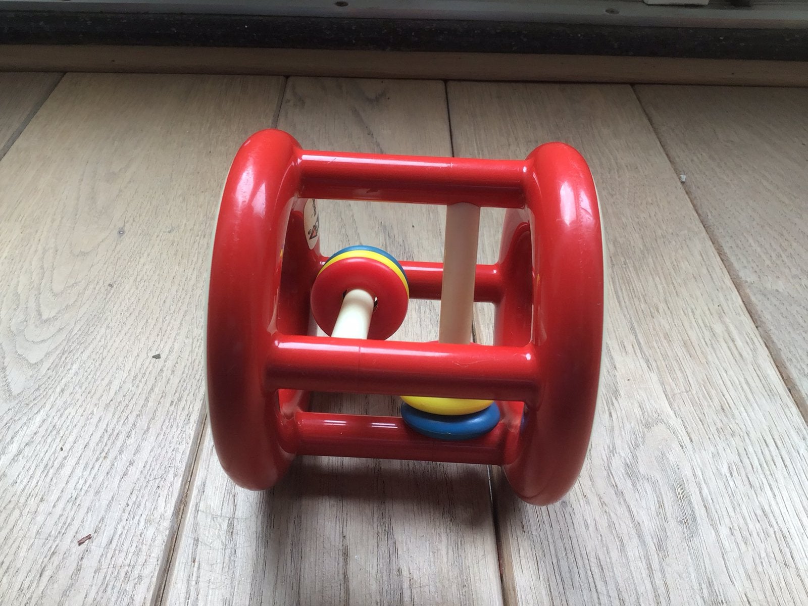 Ambi Toys rammelaar rollend babyspeelgoed met ringen., Ophalen of Verzenden, Gebruikt, Rammelaar
