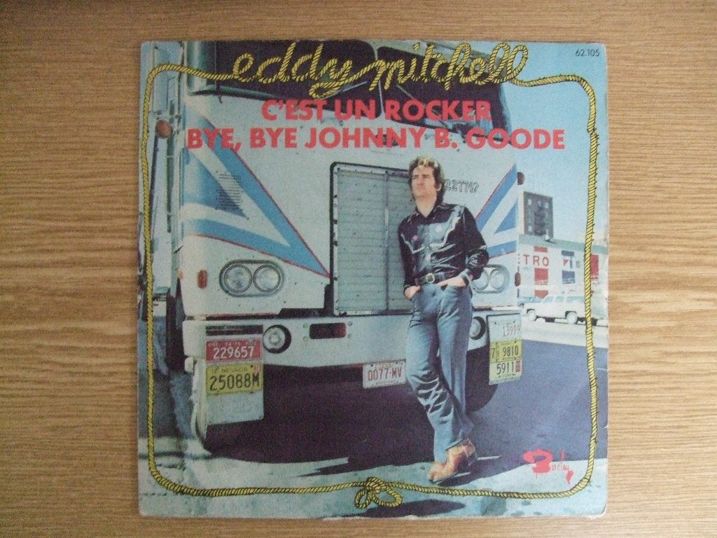 EDDY MITCHELL     C'EST UN ROCKER / BYE, BYE JONNY B. GOODE, 7 inch, Ophalen of Verzenden, Zo goed als nieuw, Pop