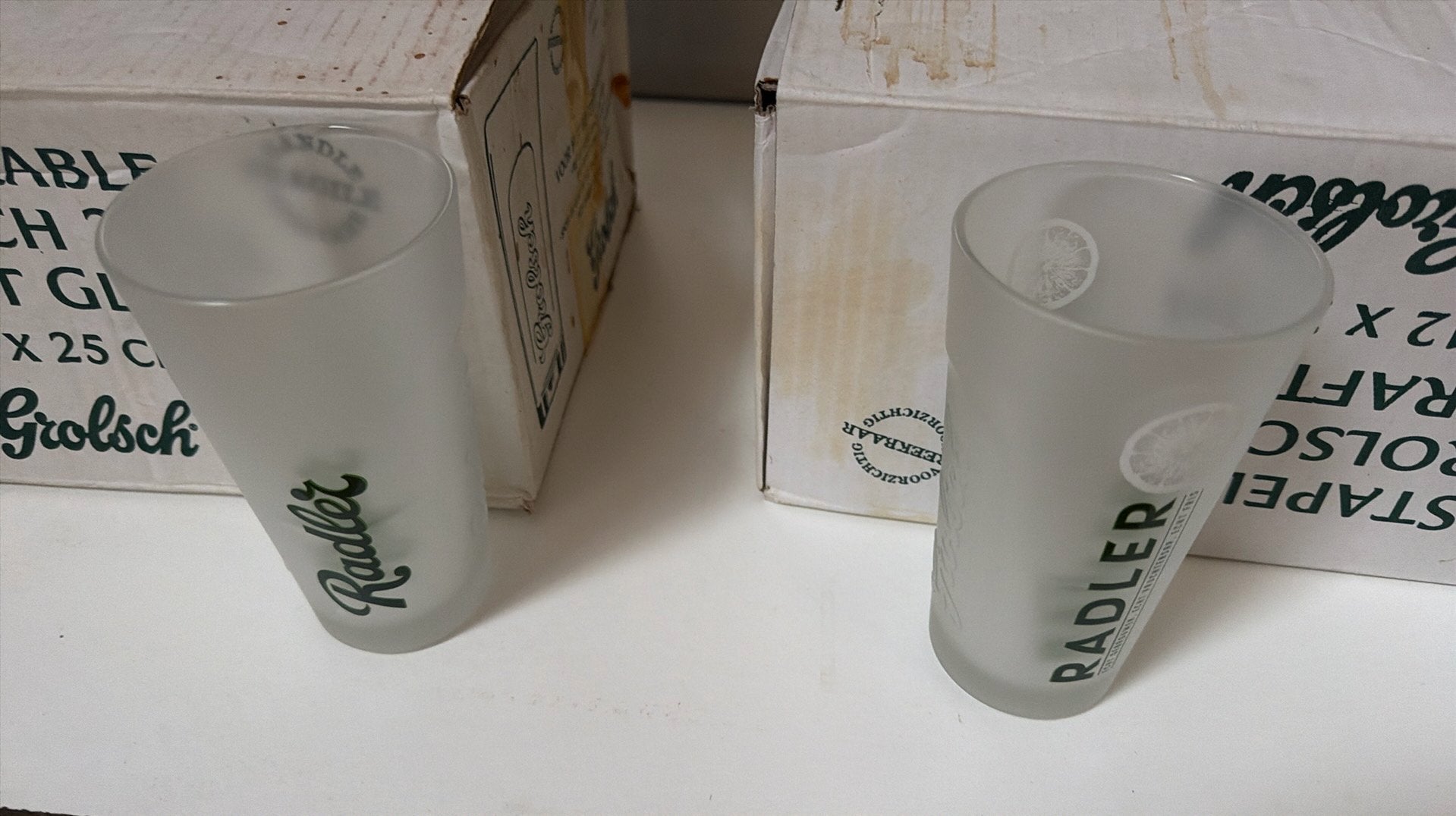 Grolsch Radler Glazen 24 stuks (2 soorten), Ophalen, Zo goed als nieuw, Bierglas