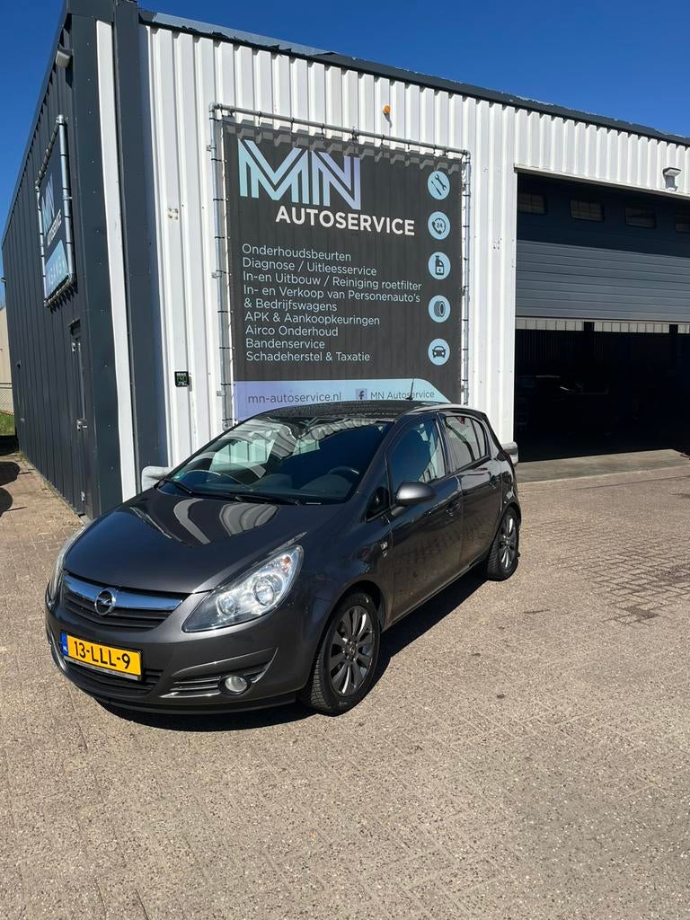 Opel Corsa 1.4 16V 5D Automaat 2010 Grijs, Auto's, Opel, Euro 5, Stof, 4 cilinders, 100 pk