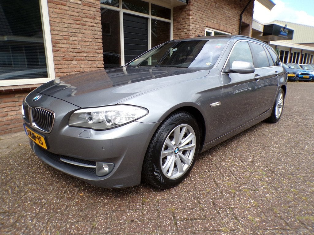 BMW 5-serie Touring 520d High Executive Automaat / Leder / N, Auto's, Automaat, Euro 5, Achterwielaandrijving, 2000 kg