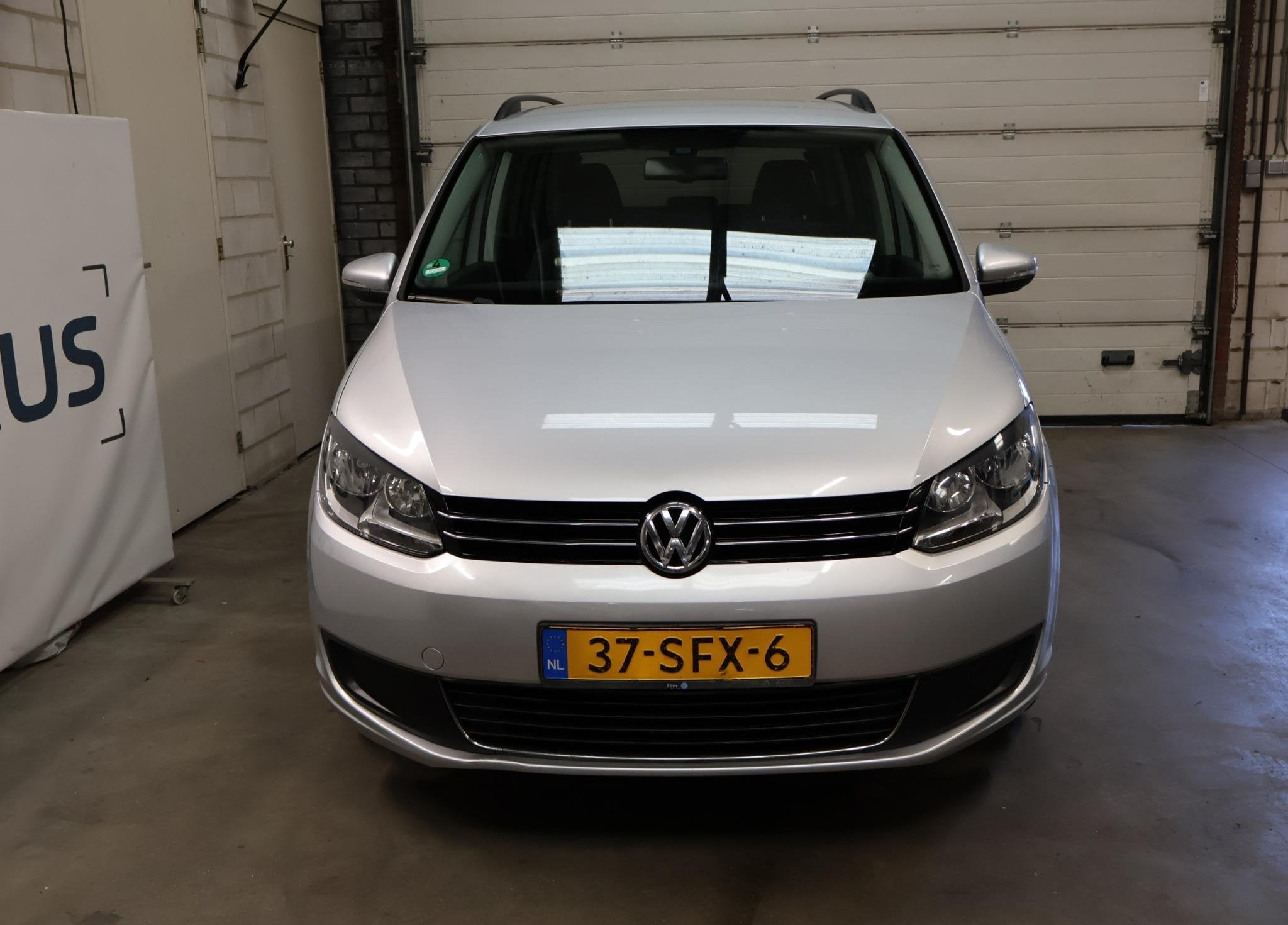 Volkswagen Touran 1.2 TSI Comfortline BlueMotion 7p. NAP 2e, Voorwielaandrijving, Stof, Gebruikt, Zwart