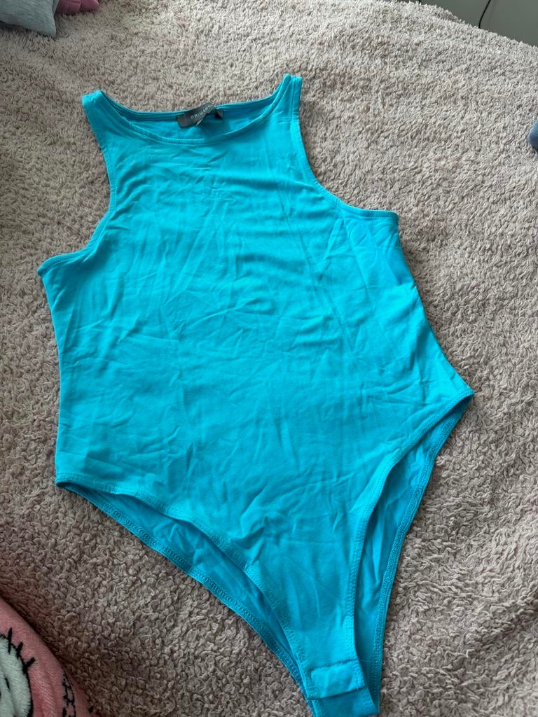 Primark turquoise body met drukknoopsluiting, maat S, Kleding | Dames, Ophalen of Verzenden, Zo goed als nieuw