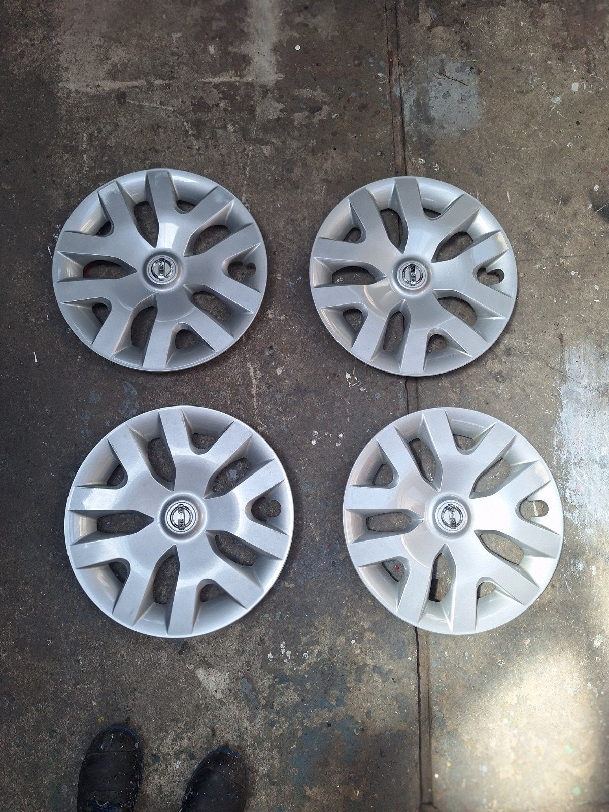 Set van 4 Nissan wieldoppen - Gebruikt, Ophalen of Verzenden, Gebruikt