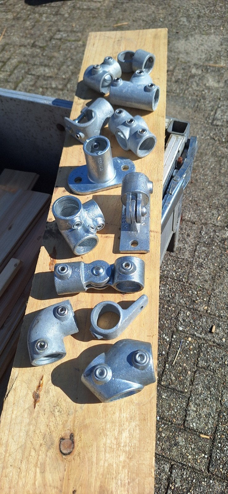 Nieuwe steigerbuis koppelingen 33,7mm - diverse typen, Ophalen, Nieuw